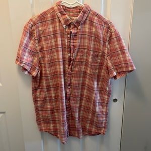 Button up pink plaid shirt.